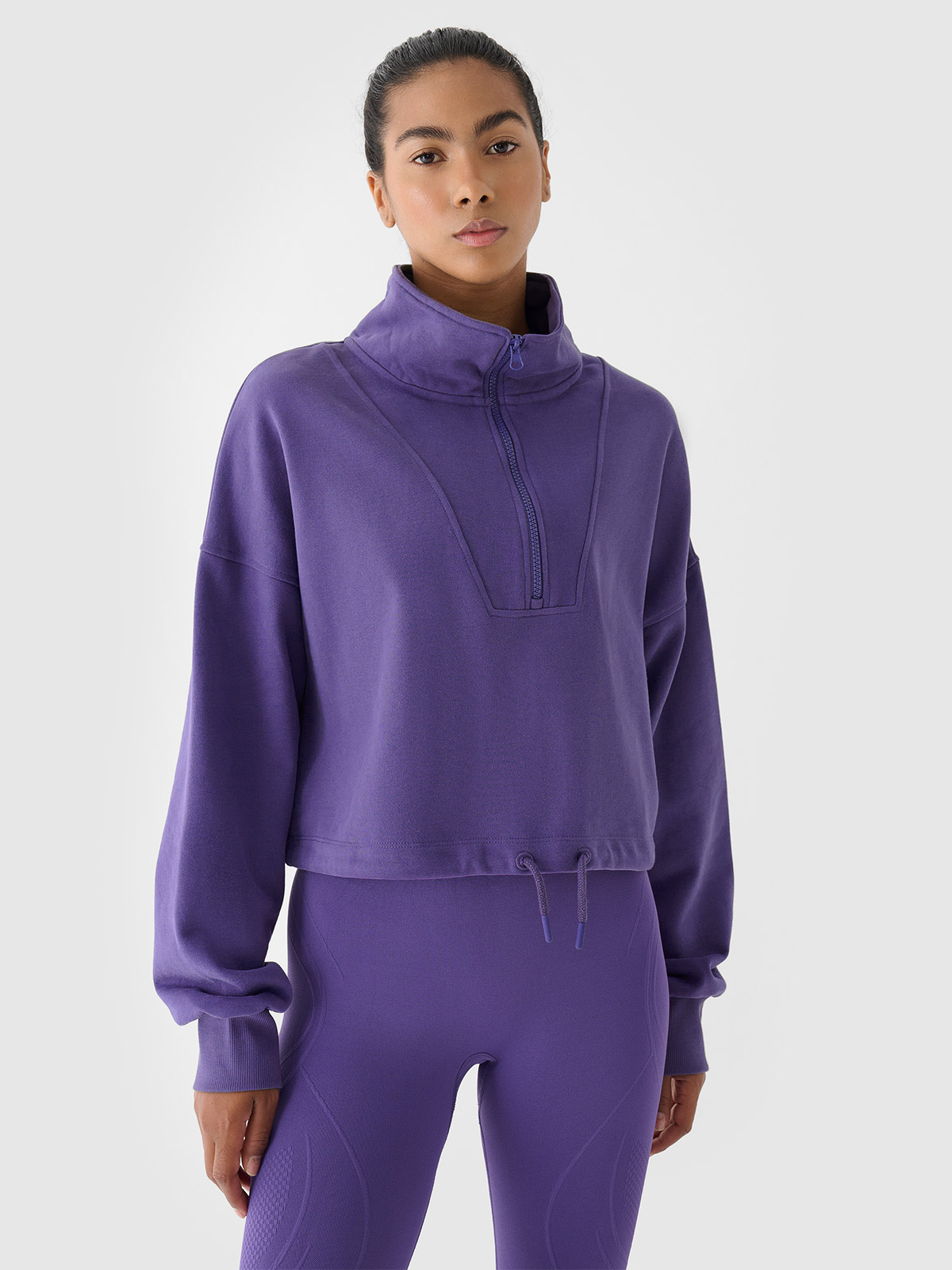 Moteriškas sportinis džemperis be gobtuvo 4F x Anna Lewandowska- violetinis