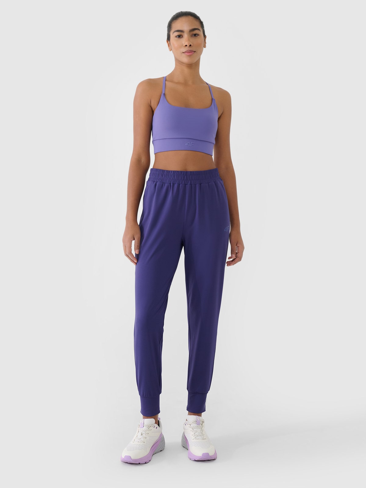 Moteriškos greitai džiūstančios treniruočių kelnės - tamsiai mėlynos