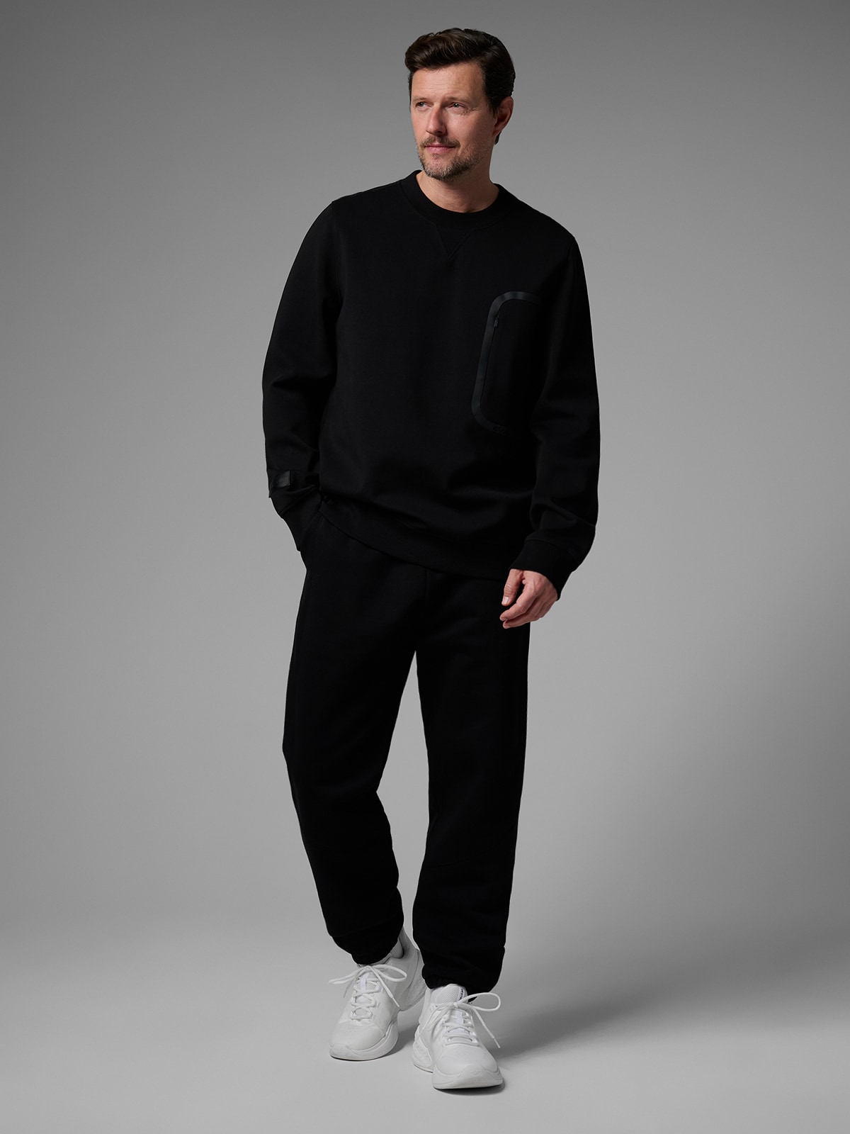 Vyriškos sportinės jogger kelnės 4F x Robert Lewandowski - juodos