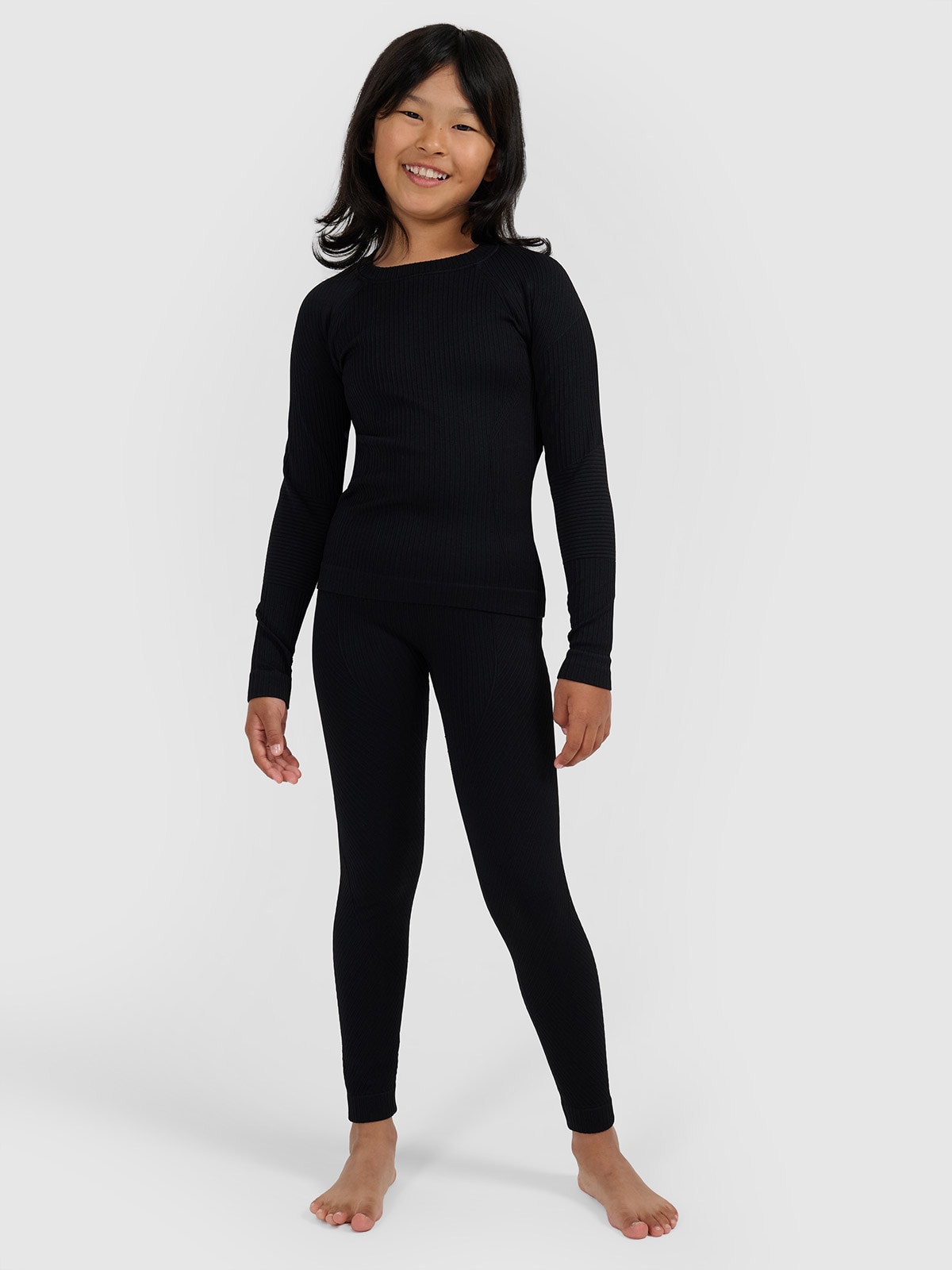 Termoaktyvus besiūlis apatinis trikotažas mergaitėms - juodas