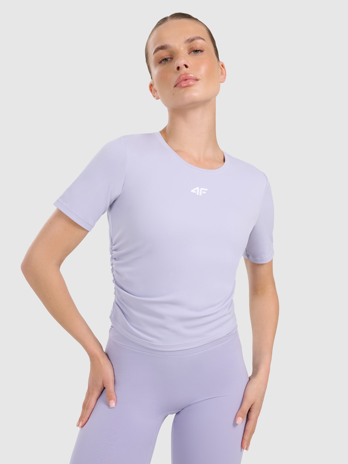 Moteriški top greitai džiūstantys marškinėliai jogai ir pilatesui - violetiniai