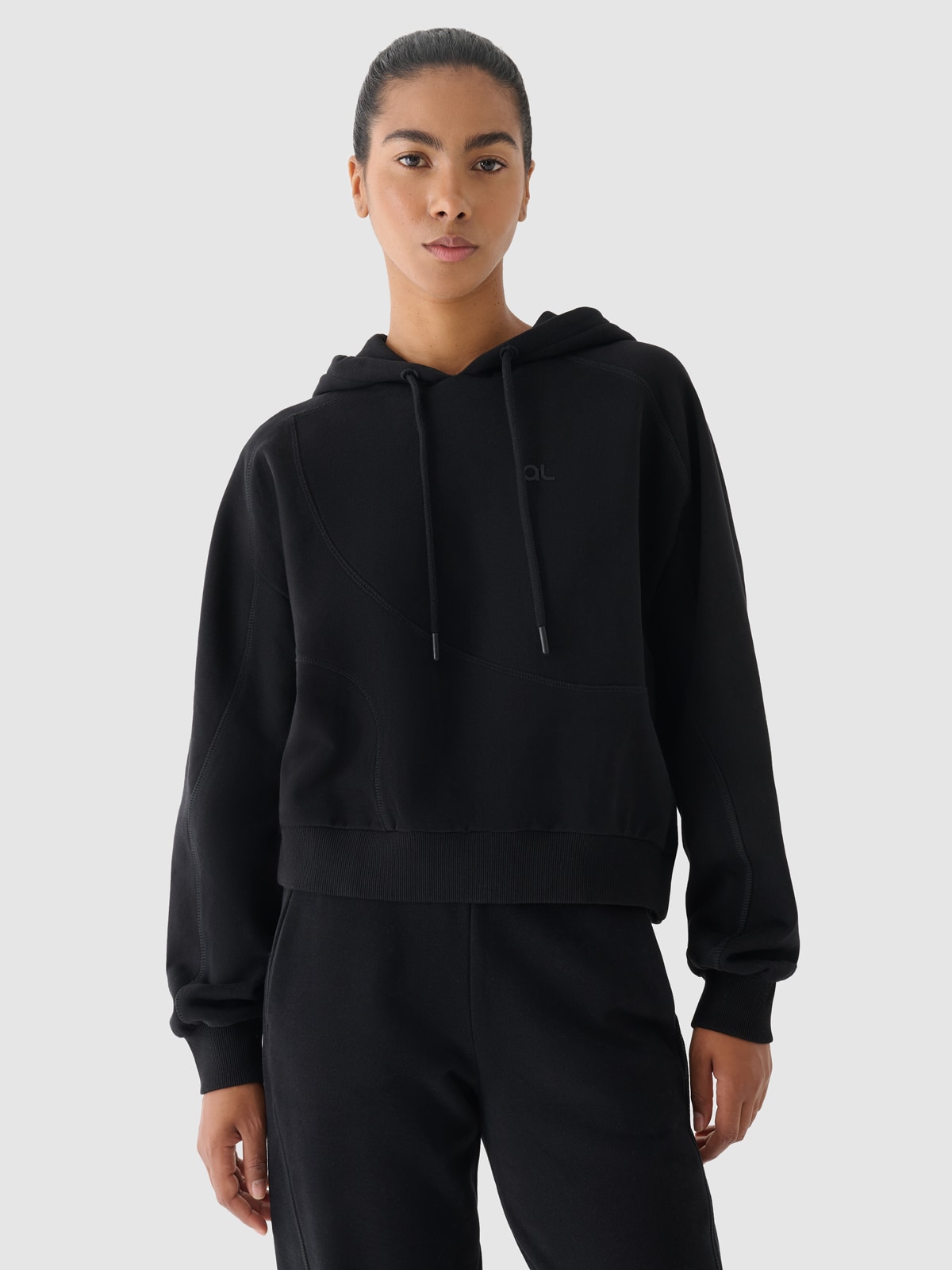 Moteriškas sportinis džemperis su gobtuvu 4F x Anna Lewandowska - juoda