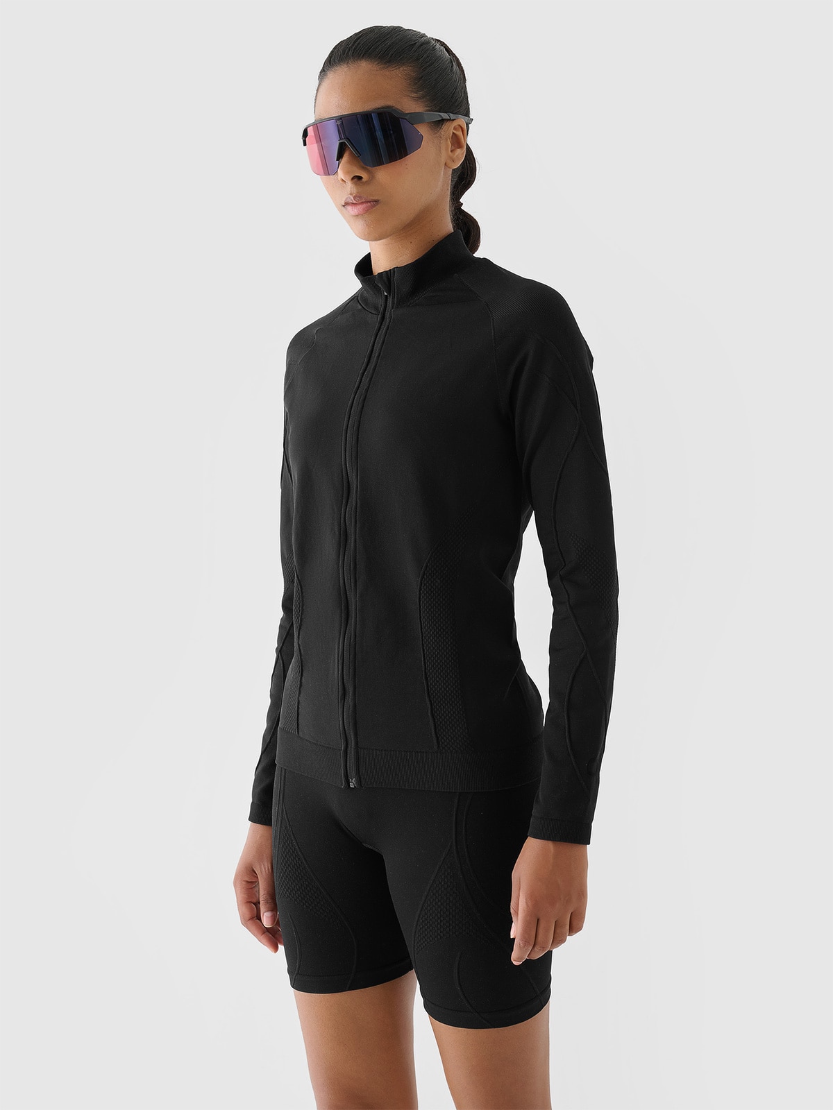 Moteriškas besiūlis atsegamas treniruočių džemperis be gobtuvo 4F x Anna Lewandowska - juodas