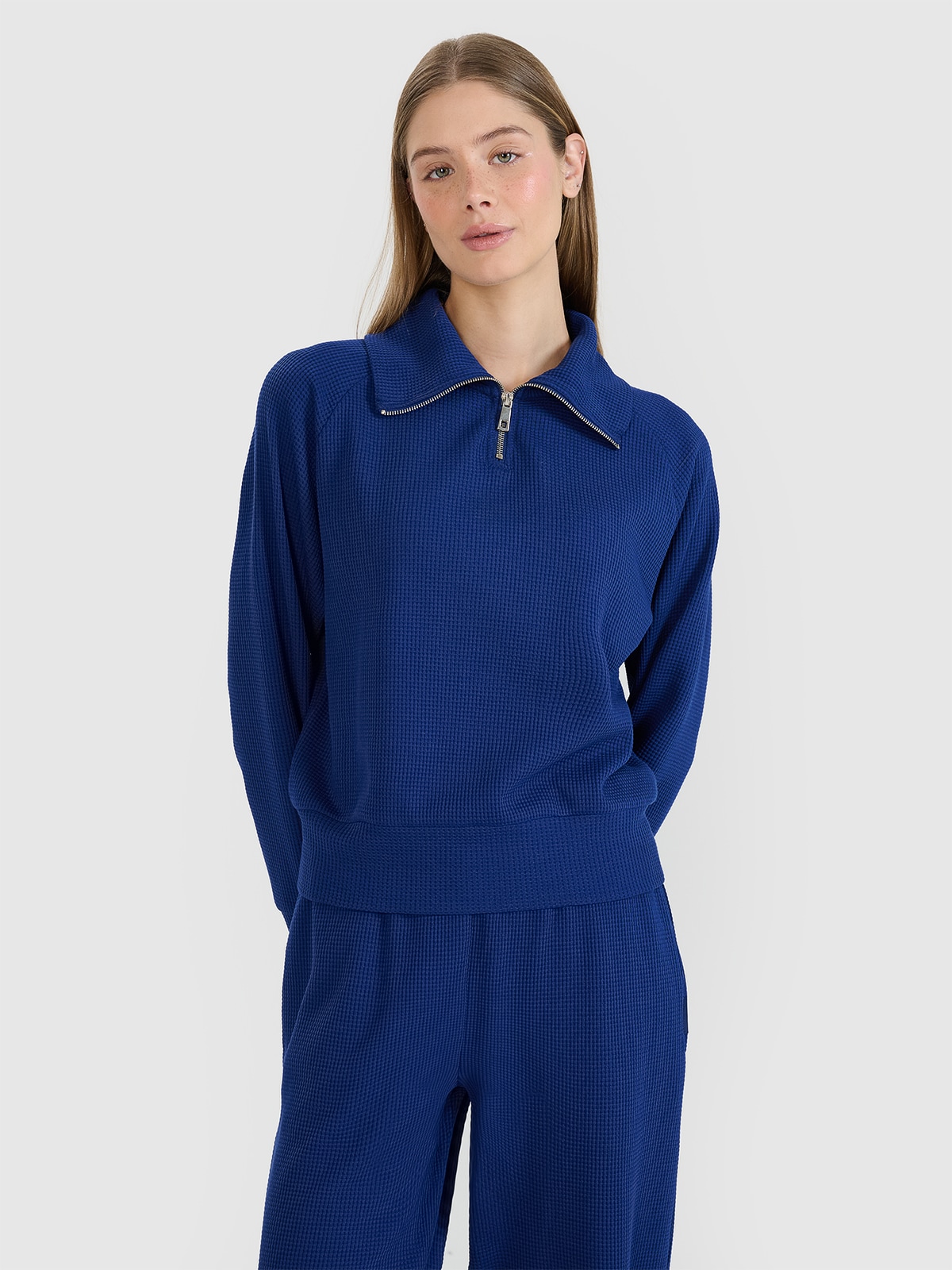 Moteriškas sportinis oversize neatsegamas džemperis be gobtuvo - tamsiai mėlyni