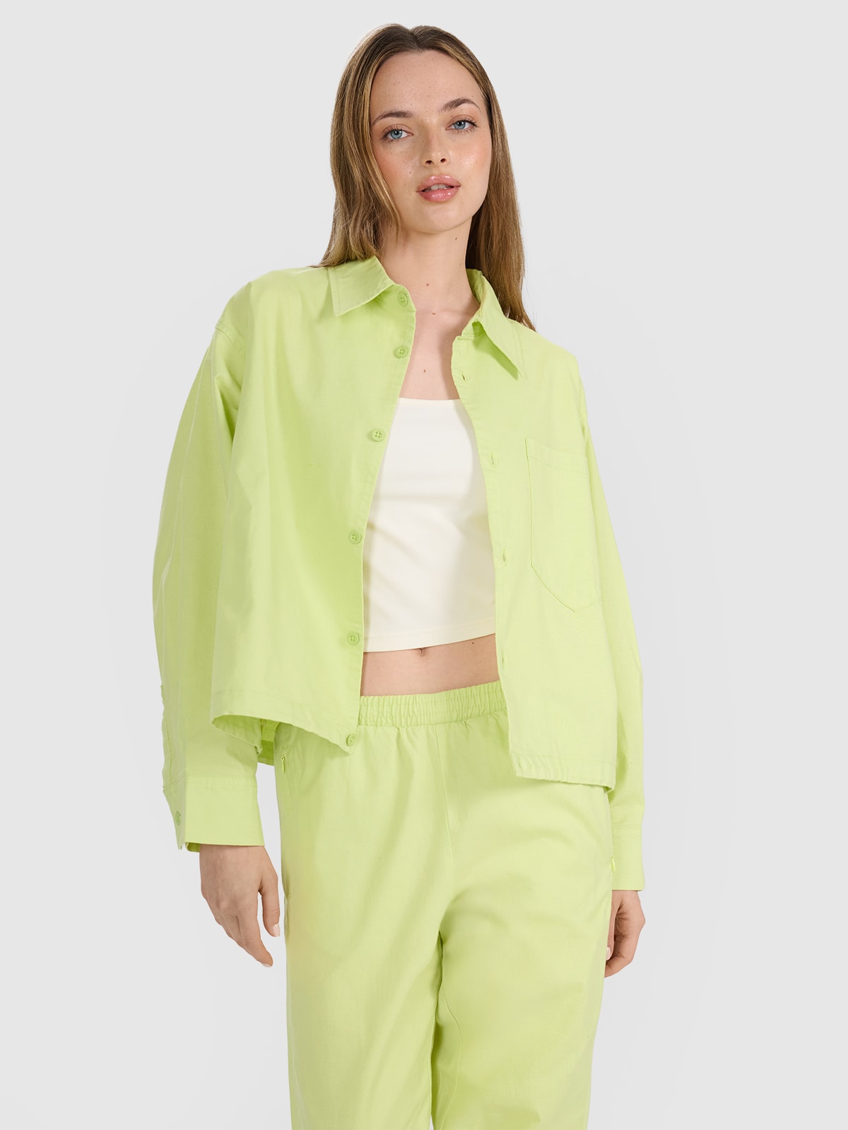 Moteriški oversize marškinėliai su apykakle - geltoni