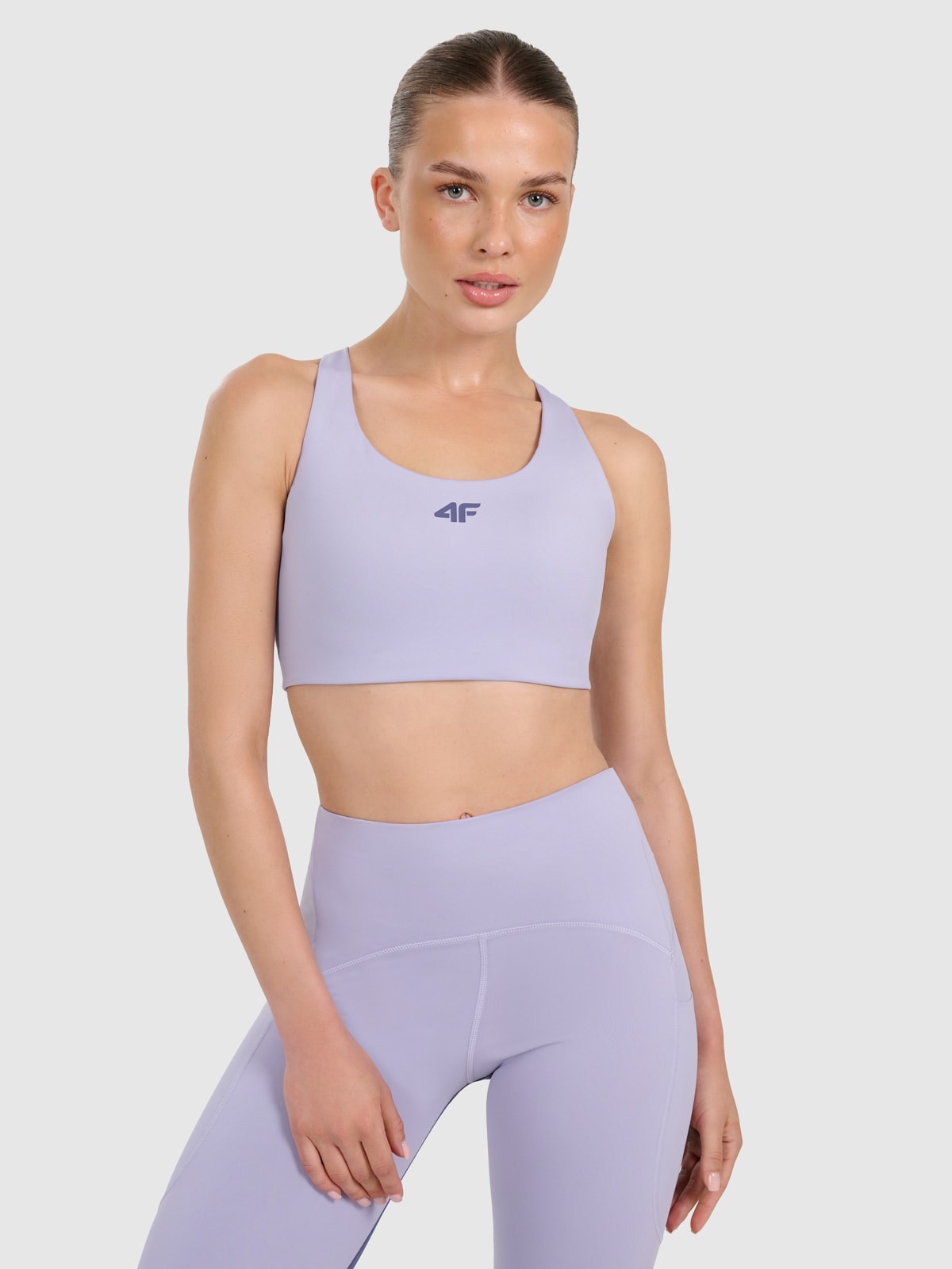 Treniruočių liemenėlė užtikrinanti vidutinę paramą - mėlyna