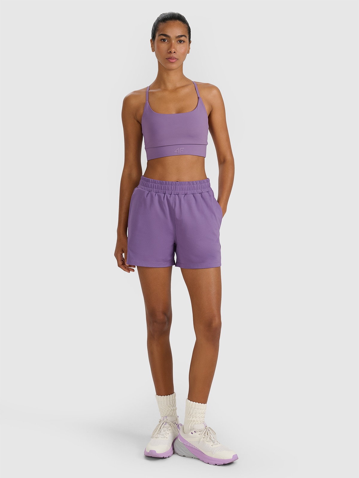 Moteriški greitai džiūstantys treniruočių šortai - violetiniai