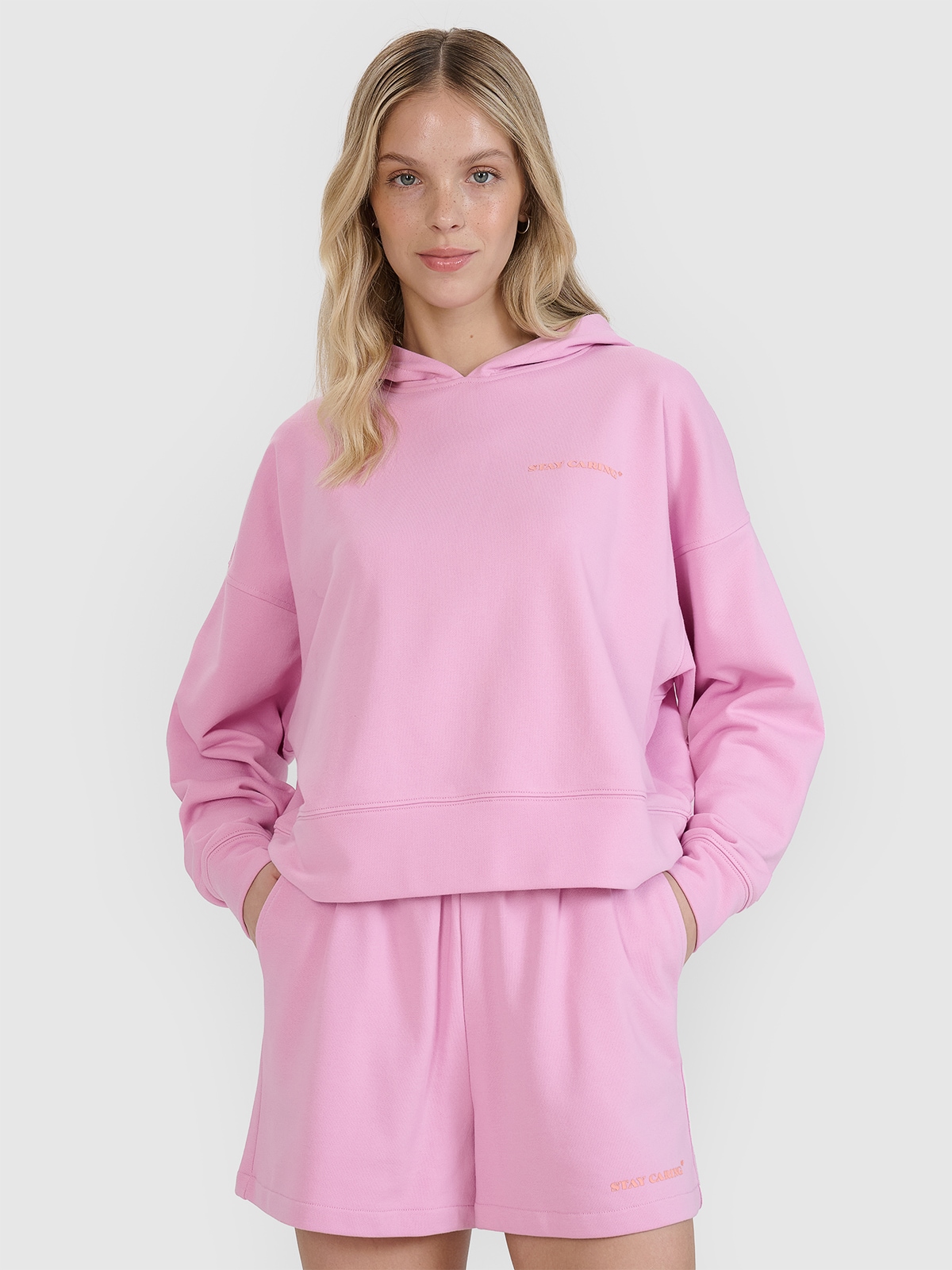 Moteriškas sportinis neatsegamas džemperis su gobtuvu - pudra rožinė spalva