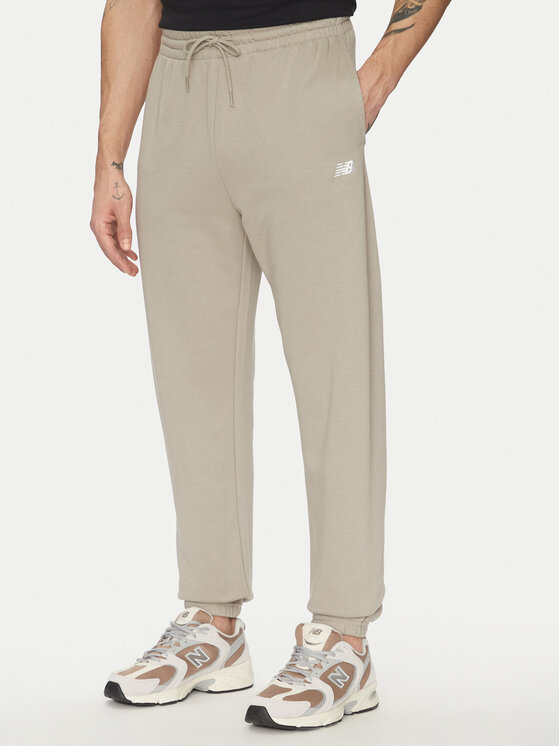 New Balance Sportinės kelnės · Smėlio · Relaxed Fit