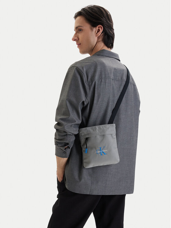 Calvin Klein Maža rankinė · Pilka