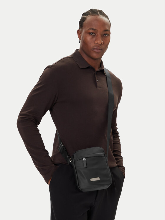 Calvin Klein Maža rankinė · Juoda