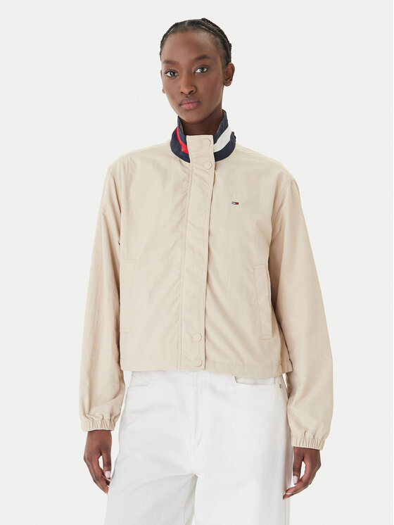 Tommy Jeans Demisezoninė striukė · Smėlio