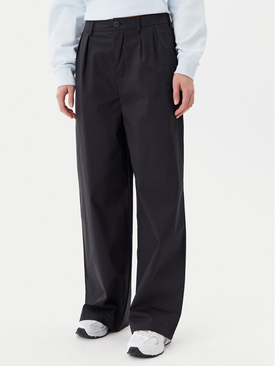 New Balance Medžiaginės kelnės · Juoda · Relaxed Fit