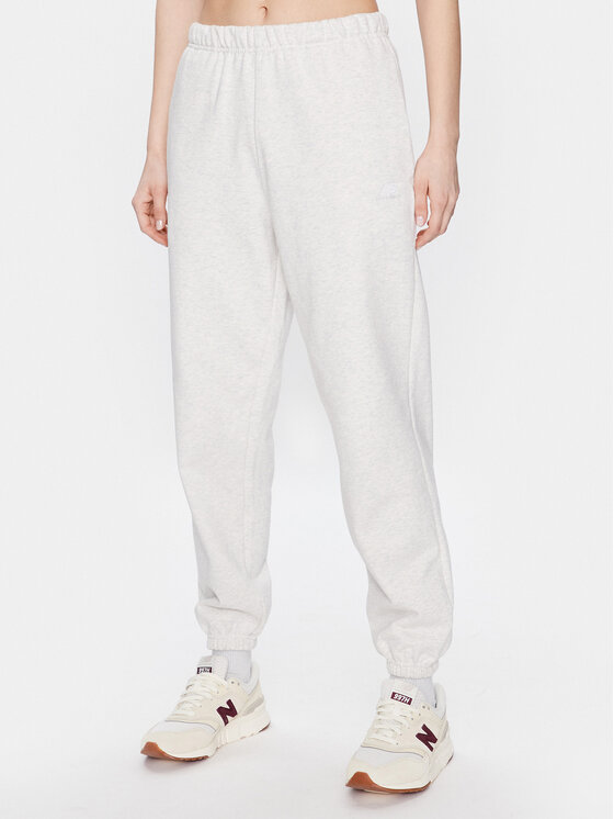 New Balance Sportinės kelnės · Smėlio · Relaxed Fit