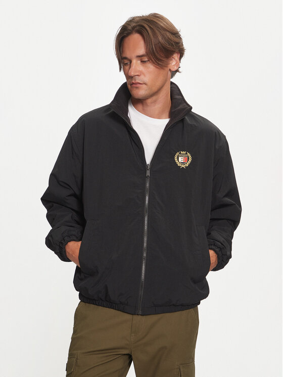 Tommy Jeans Demisezoninė striukė · Juoda